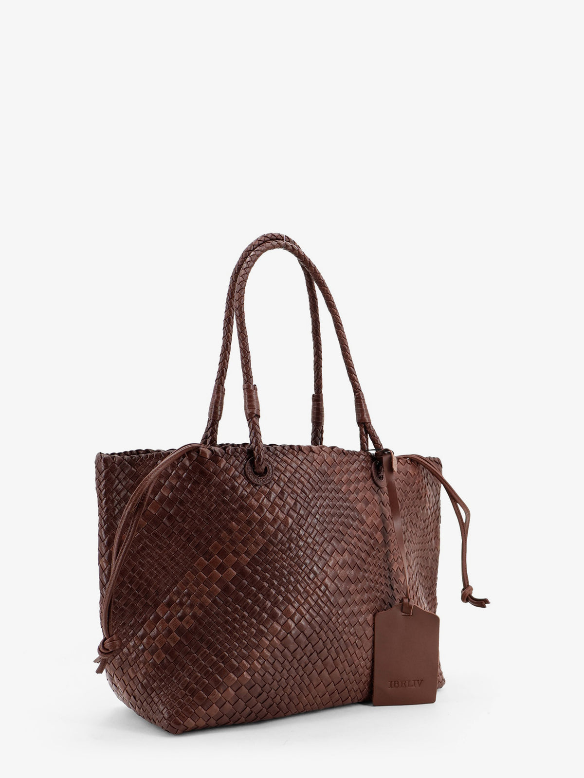 Bazika vegetable leather shoulder bag with woven pattern