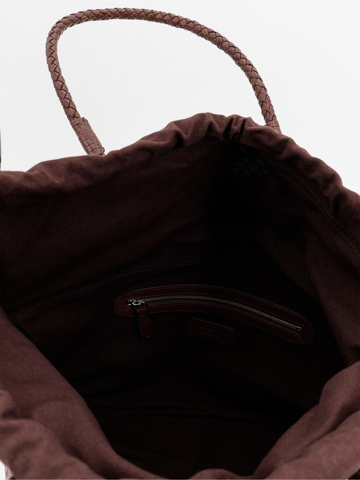 Bazika vegetable leather shoulder bag with woven pattern