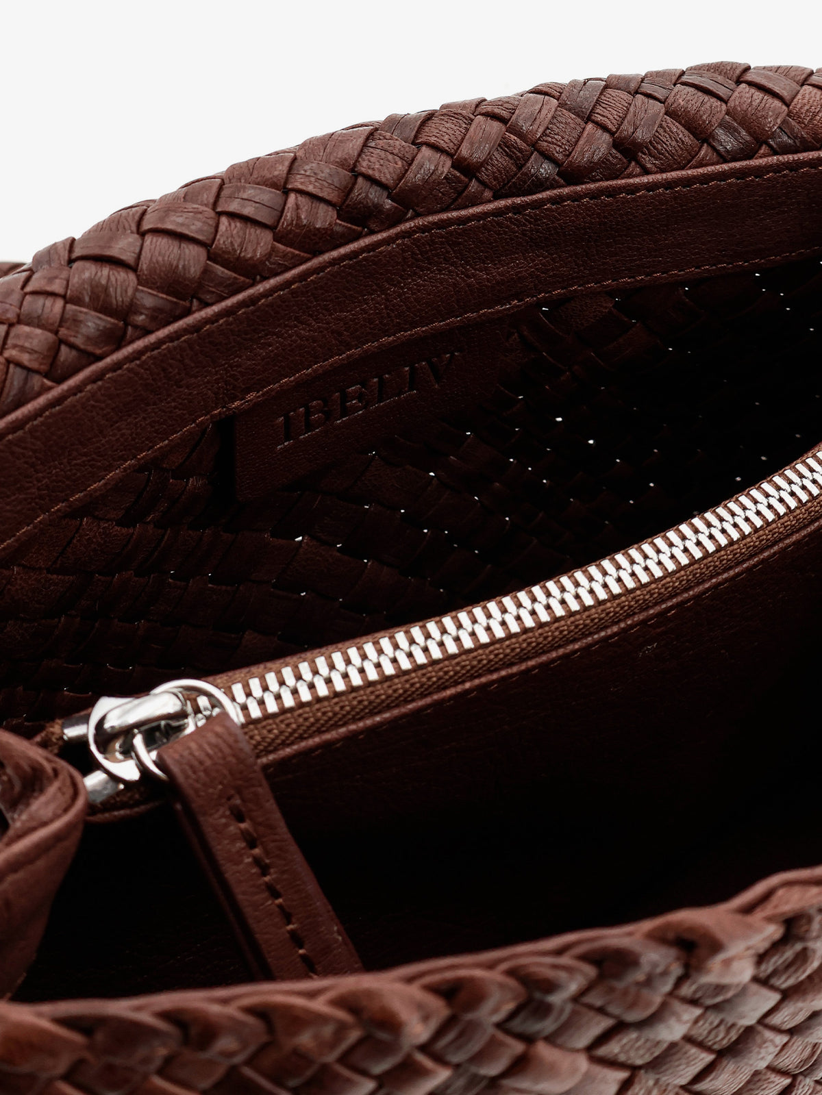 Paris vegetable leather shoulder bag with woven pattern