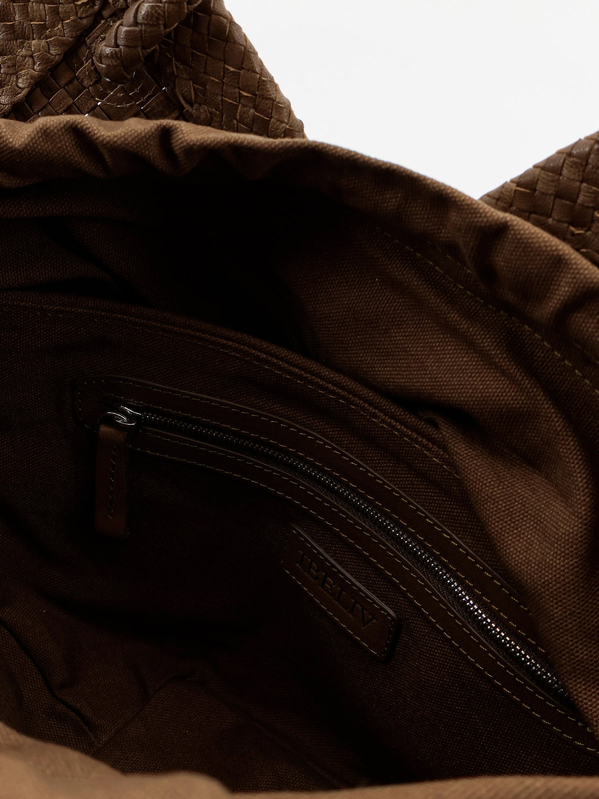 Trinity Medium vegetable-tanned leather shoulder bag with a woven pattern