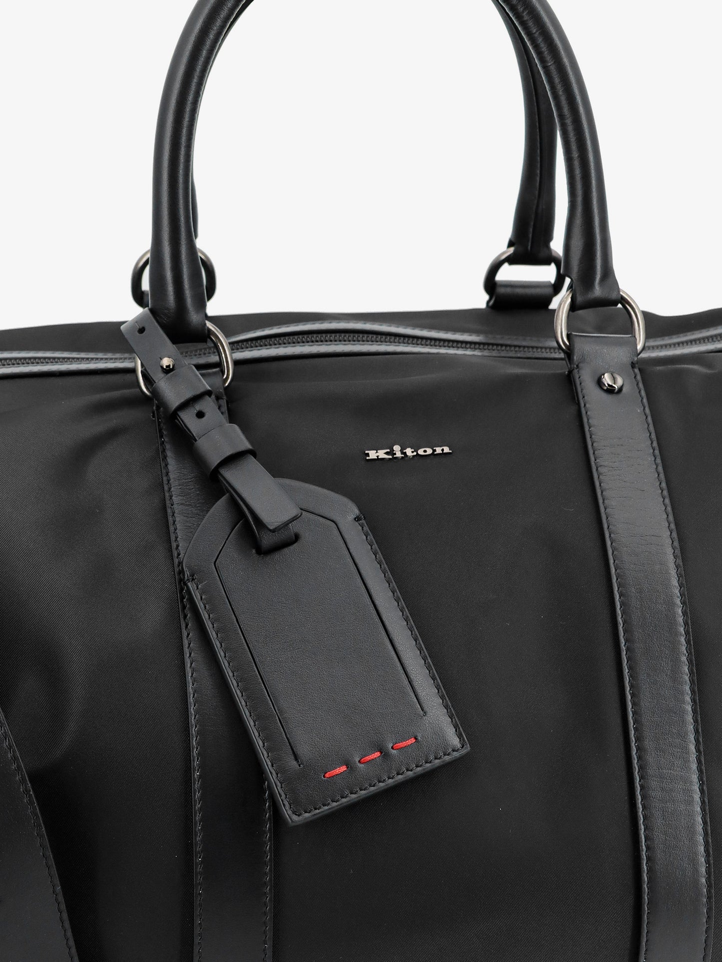 Nylon travel bag with leather inserts