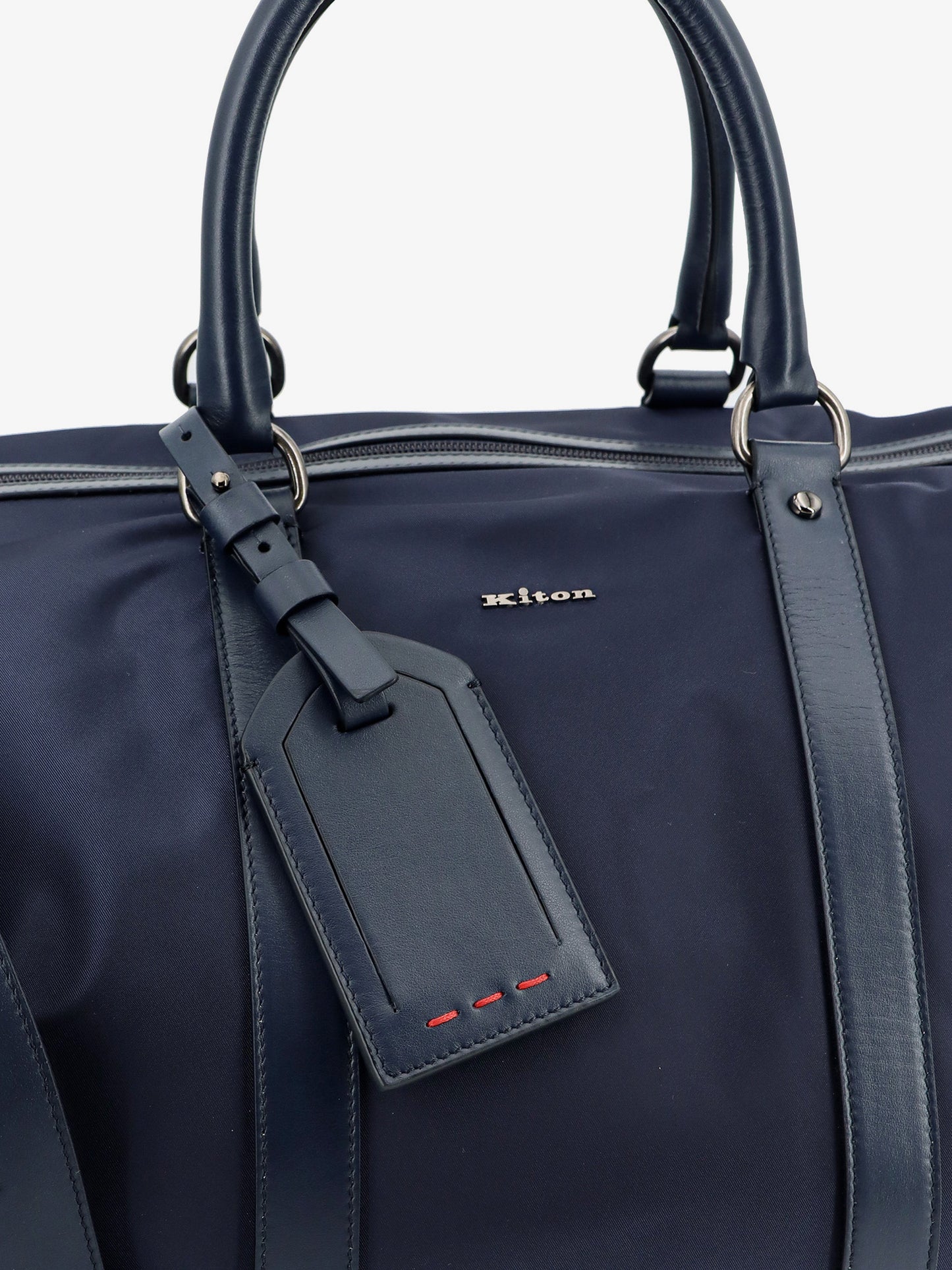 Nylon travel bag with leather inserts