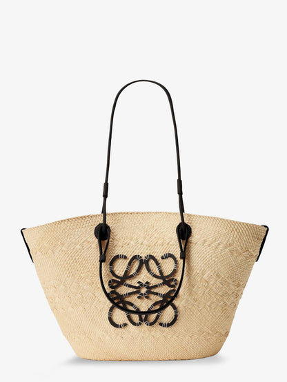 Paula's Ibiza Anagram leather and iraca palm shoulder bag thumbnail