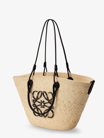 Paula's Ibiza Anagram leather and iraca palm shoulder bag thumbnail