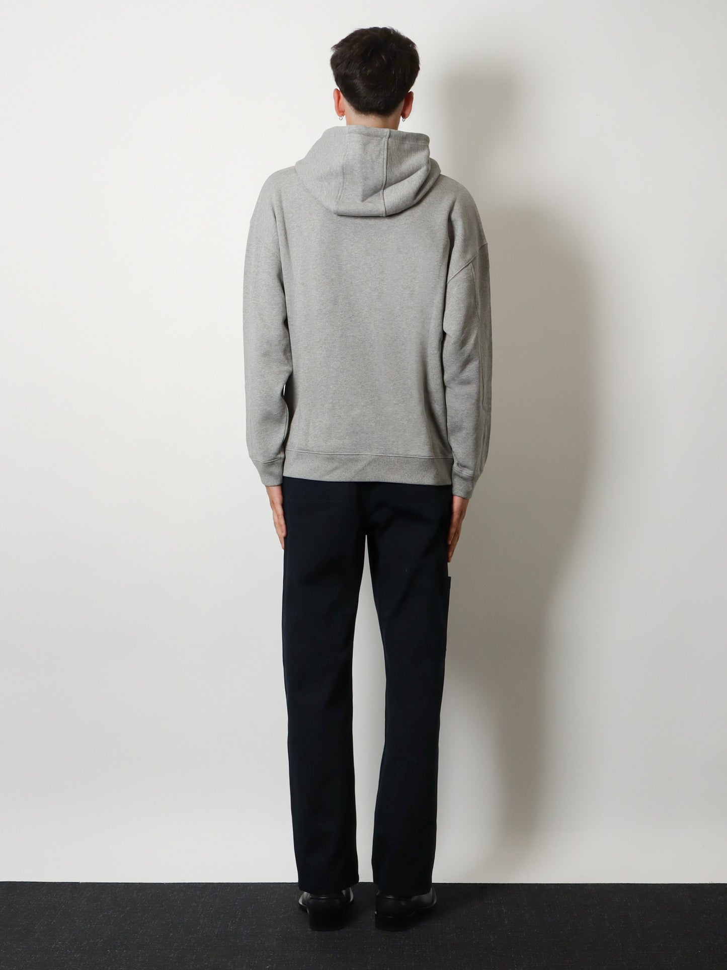 Denim trousers with contrasting embroidered logo