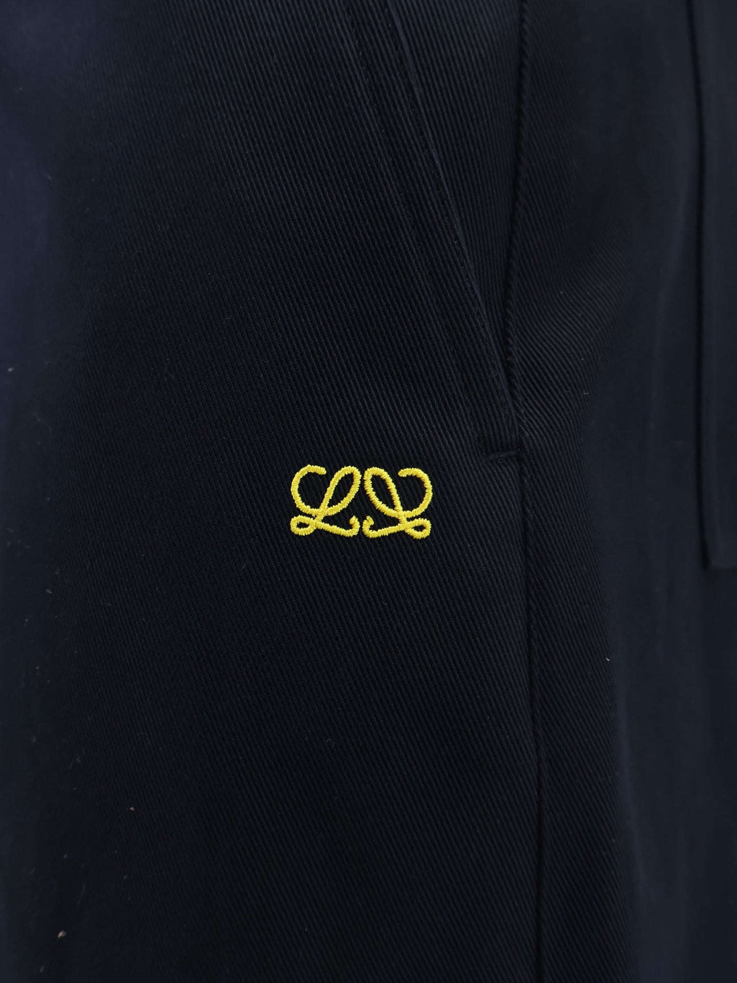 Denim trousers with contrasting embroidered logo