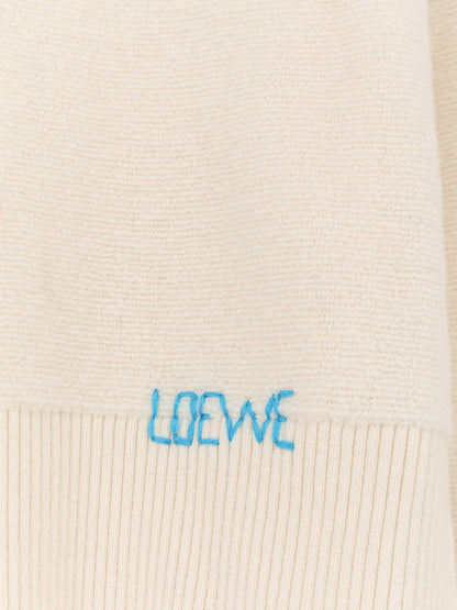 Wool sweater with contrasting embroidered logo on the bottom thumbnail