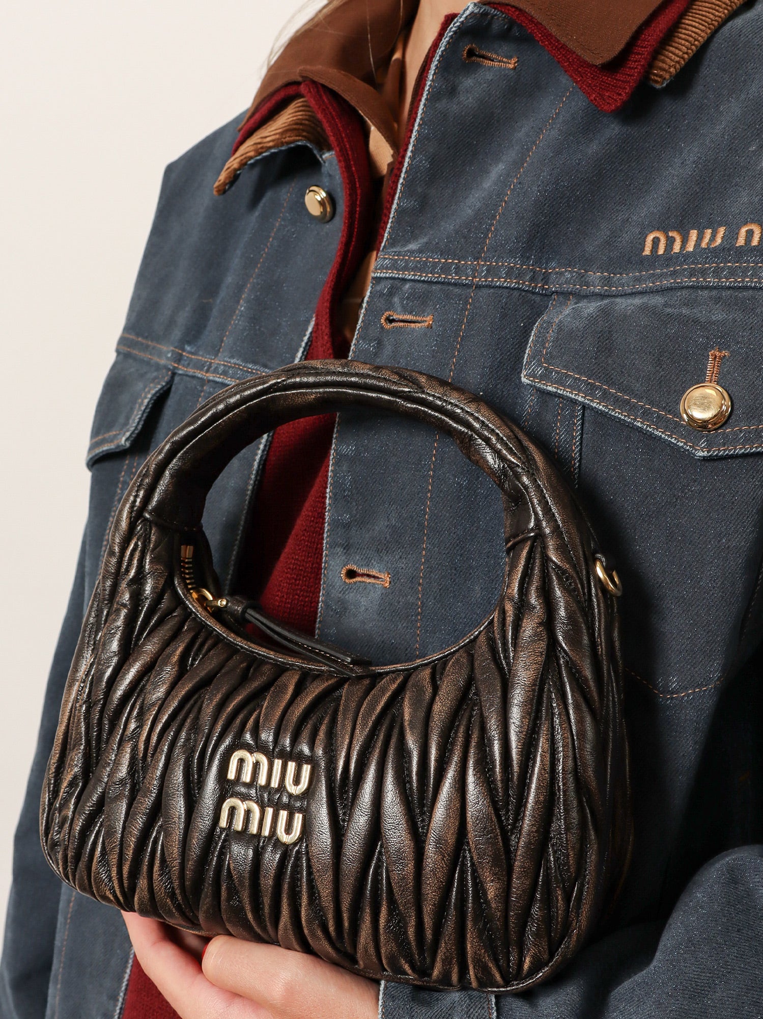 Wander quilted leather crossbody bag with a vintage effect MIU MIU