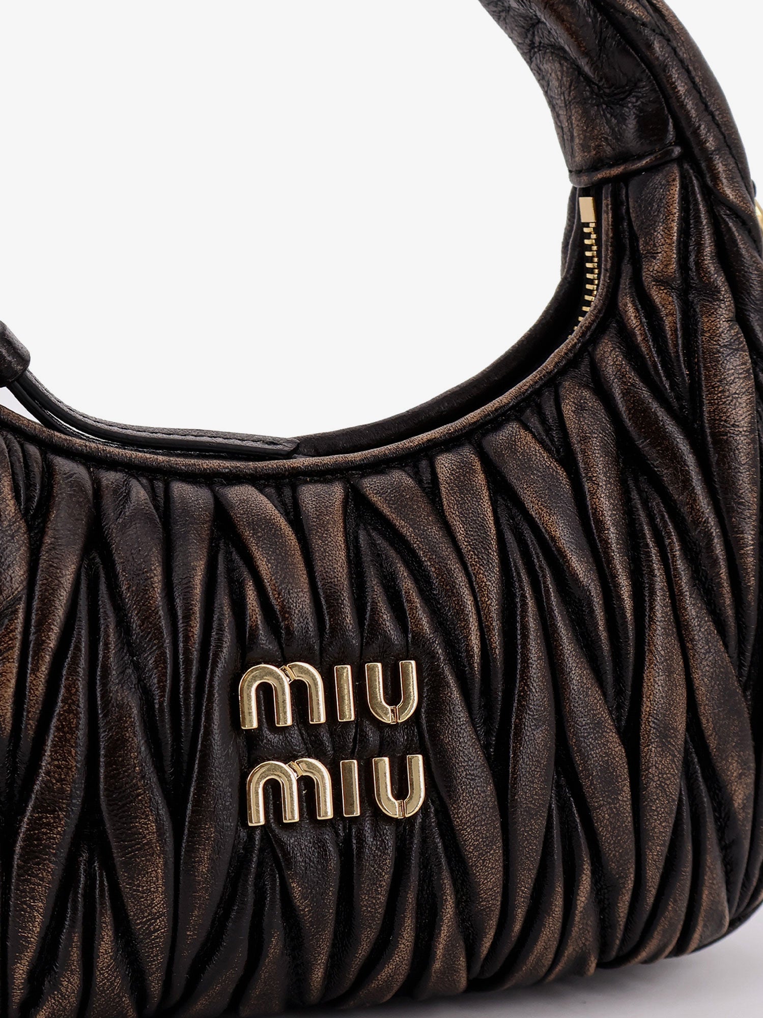 Wander quilted leather crossbody bag with a vintage effect MIU MIU