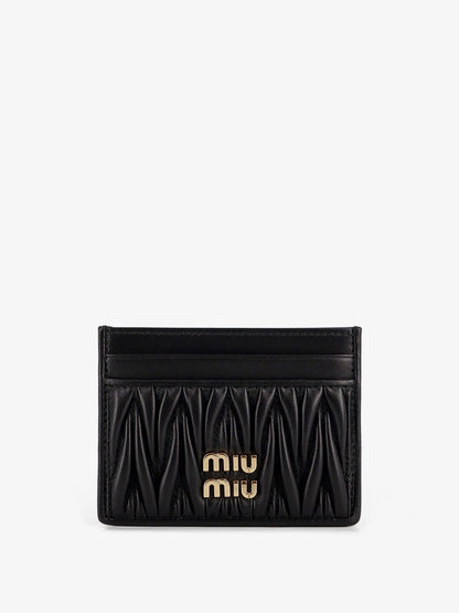 Quilted leather card holder with metal lettering logo thumbnail