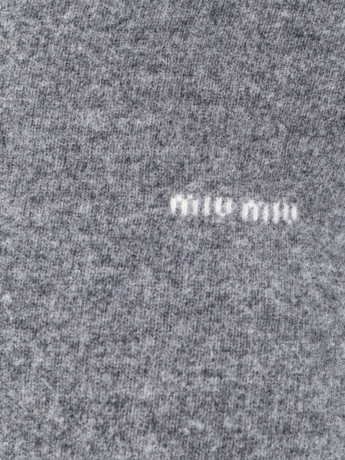 Wool sweater with logo inlay