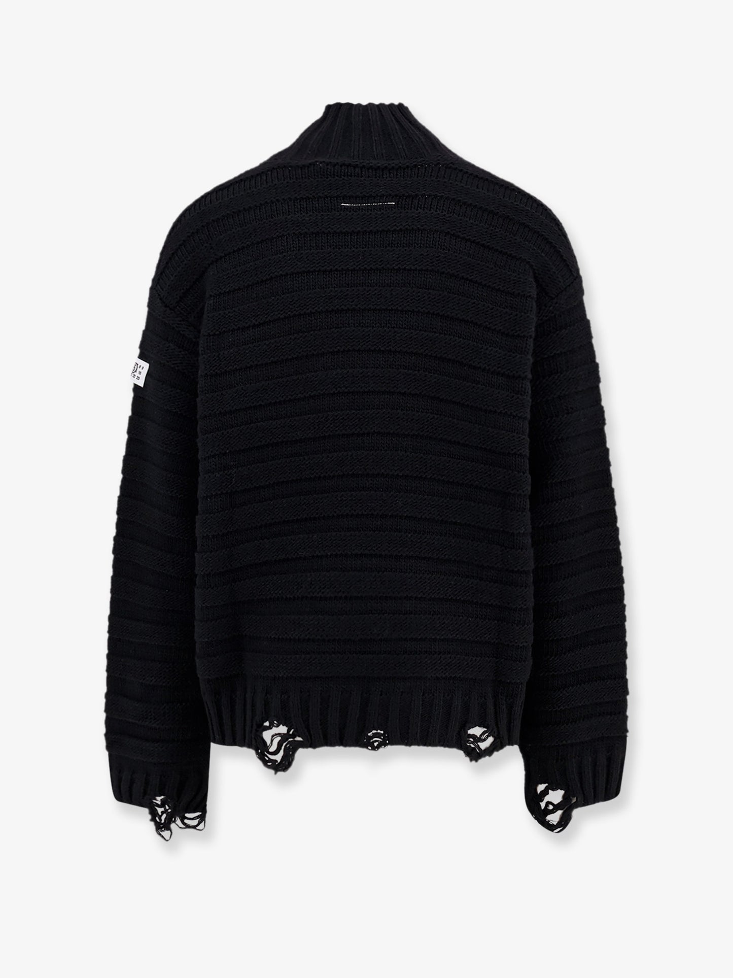 Wool blend sweater with distressed effect