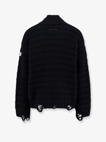 Wool blend sweater with distressed effect thumbnail