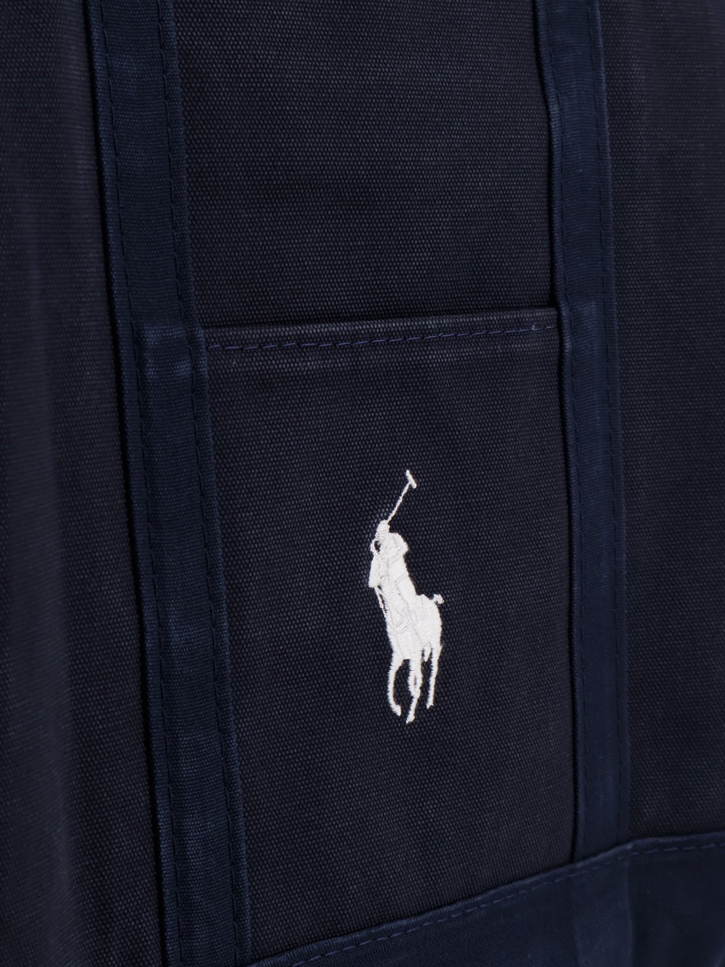 Denim shoulder bag with embroidered logo on the front