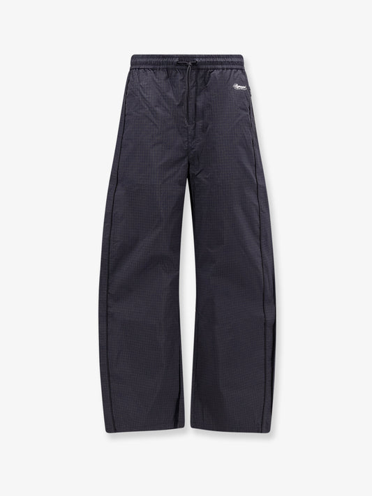 Riot Track cotton and nylon blend trousers with checked pattern
