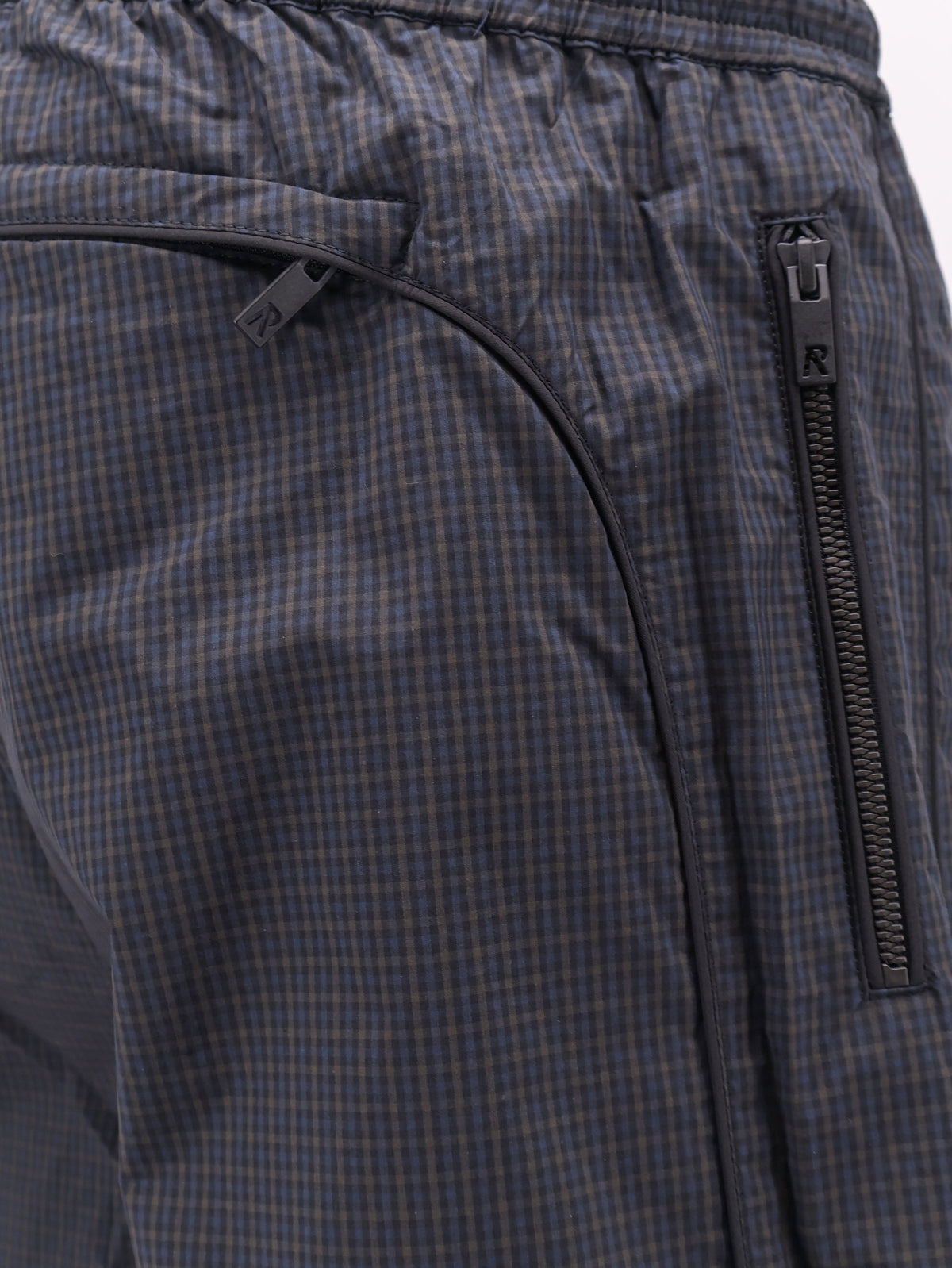 Riot Track cotton and nylon blend trousers with checked pattern