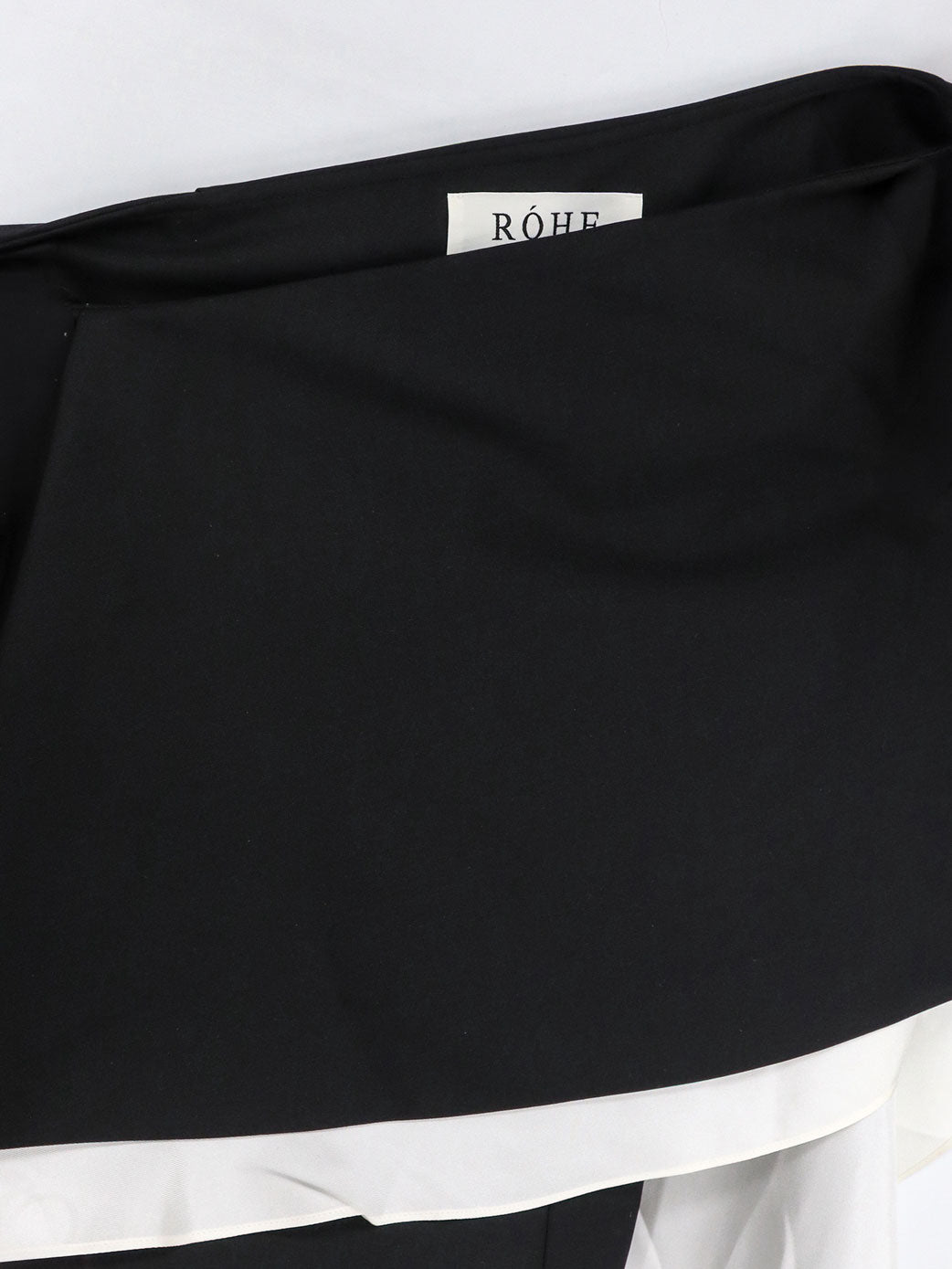 Top in misto lana con inserti in seta