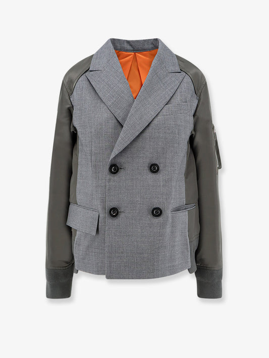 Wool blazer with nylon sleeves
