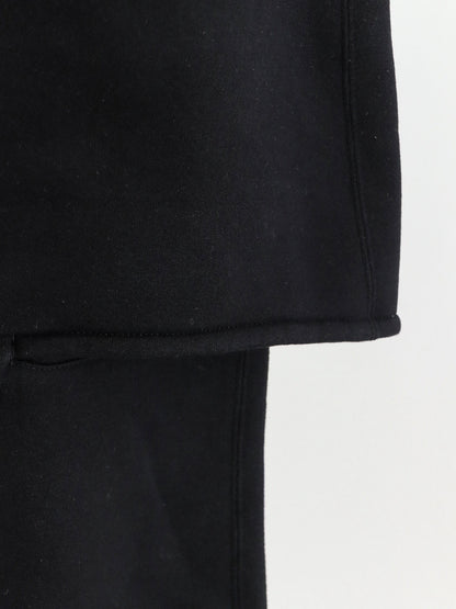 Cotton trousers with a layered trompe l'oeil design thumbnail