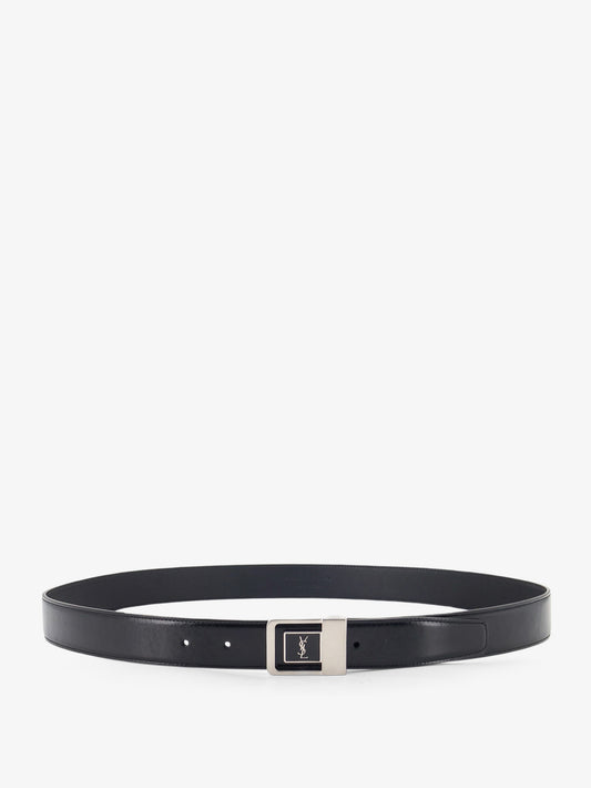 Leather belt with silver metal buckle