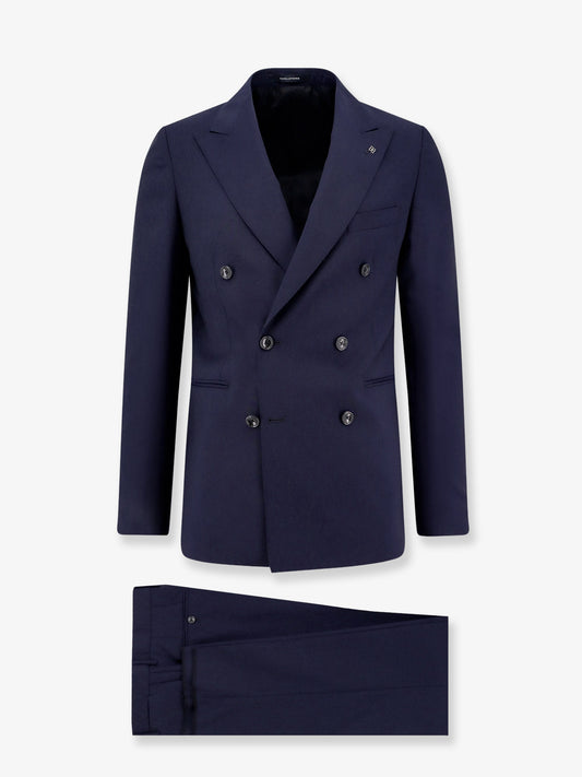 Wool suit with peak lapel and removable brooch iconic detail