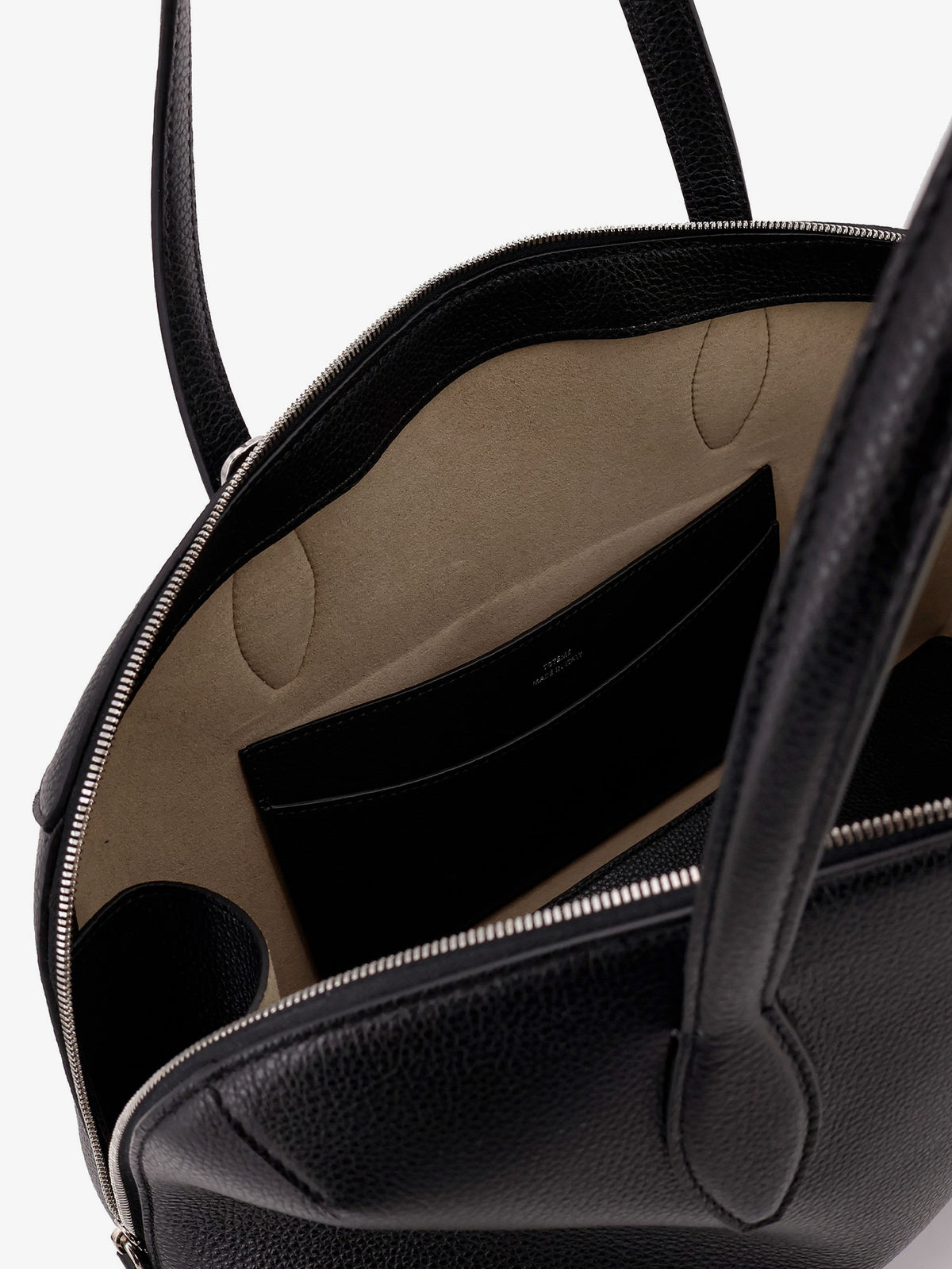 Leather handbag with engraved logo on the front