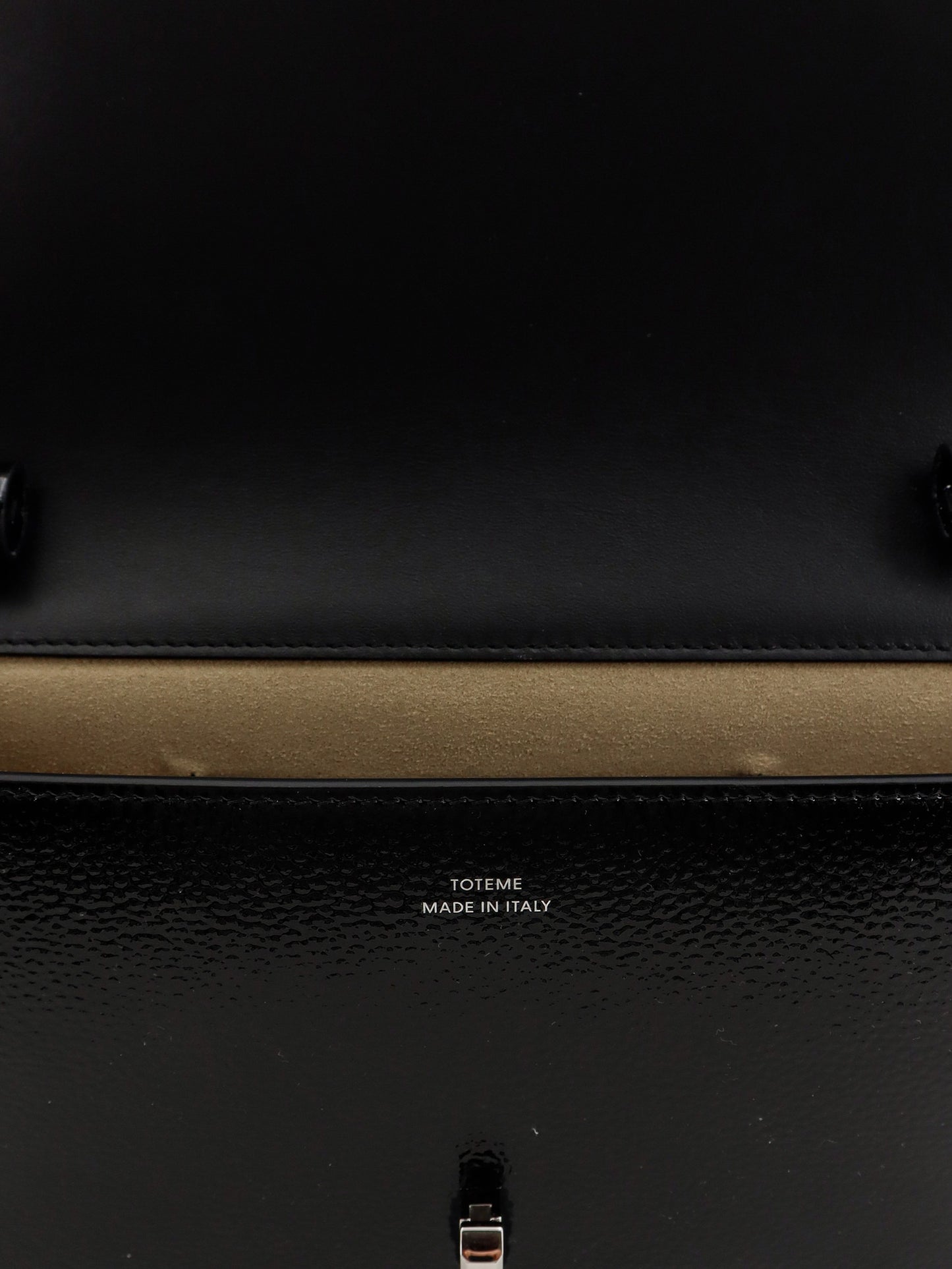 Patent T-Lock crossbody bag