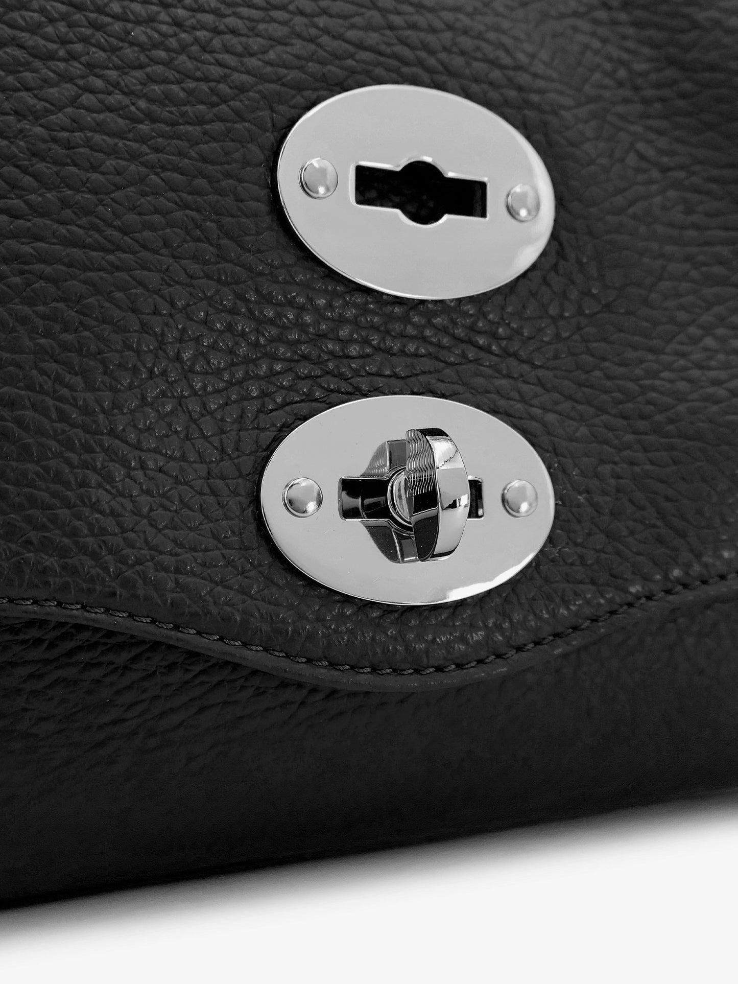 Postina® S textured leather crossbody bag